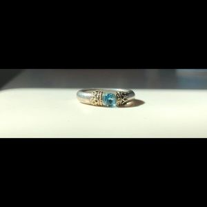 Sterling/gold and topaz ring.